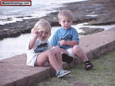 two lil kids on the beach